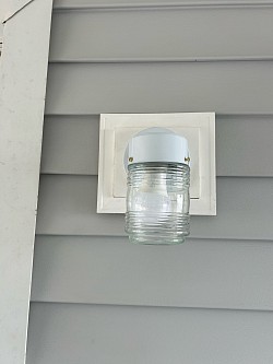 Install exterior light fixture