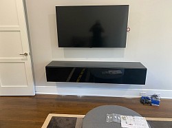 Tv mounting and floating stand installation